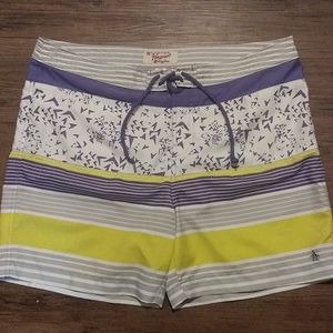 Men's penguin 🐧 swim trunks, yellow&purple, in new CONDITION,size36 New CONDITI